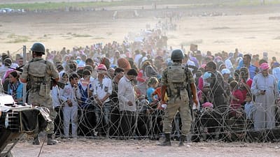 refugees waiting to cross turkey.jpg