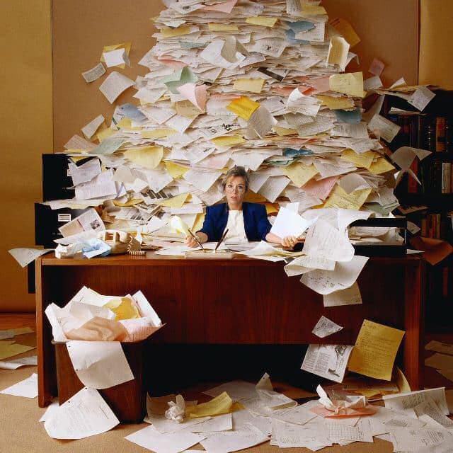 overflowing paperwork