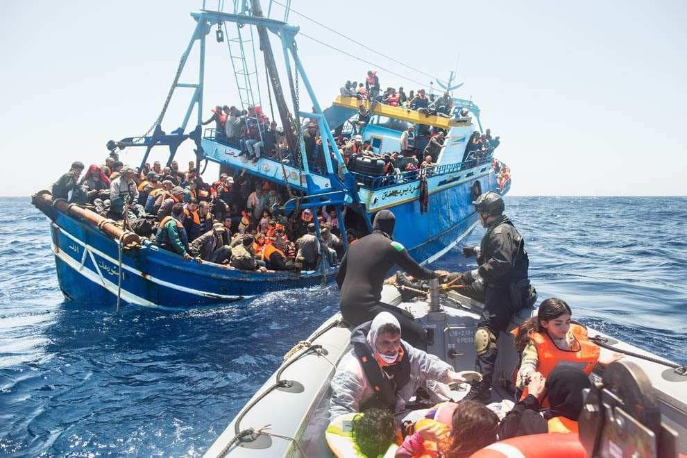 Italian navy rescue asylum seekers